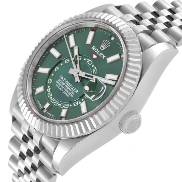 This Rolex Sky-Dweller features a distinctive mint green dial watch