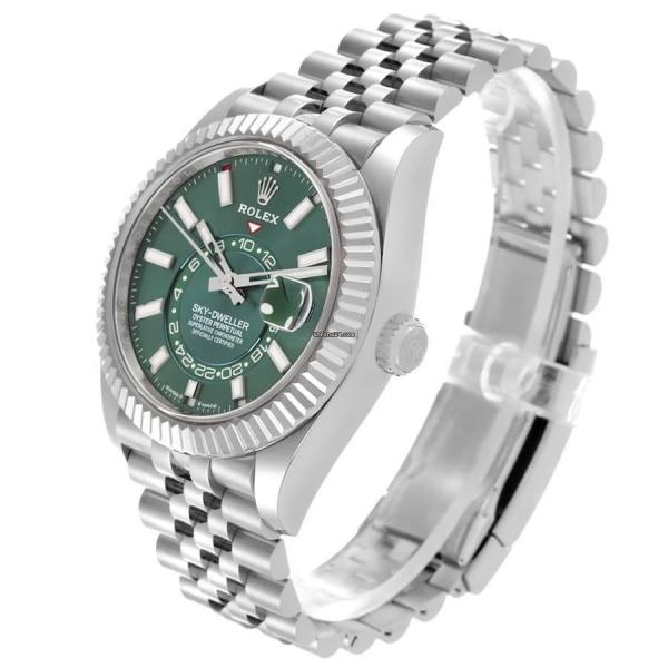 This Rolex Sky-Dweller features a distinctive mint green dial watch